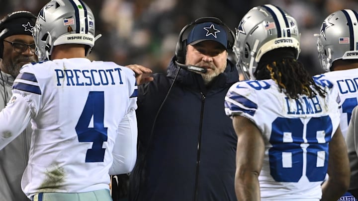 Jan 8, 2022; Philadelphia, Pennsylvania, USA; Dallas Cowboys head coach Mike McCarthy (M) celebrates with Cowboys quarterback Dak Prescott (4) and Cowboys wide receiver CeeDee Lamb (88) on the sidelines after a touchdown against the Philadelphia Eagles during the second quarter at Lincoln Financial Field. Mandatory Credit: Tommy Gilligan-Imagn Images