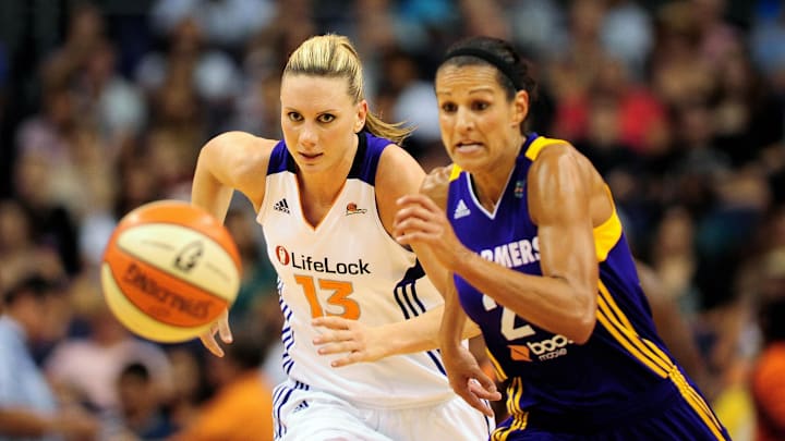 Sep 3, 2011; Phoenix, AZ, USA; Phoenix Mercury forward Penny Taylor (13) and Los Angeles Sparks guard Ticha Penicheiro (21) chase after a loose ball during the first half at the US Airways Center. Mandatory Credit: Jennifer Stewart-Imagn Images Sep 3, 2011; Phoenix, AZ, USA; Phoenix Mercury forward Penny Taylor (13) and Los Angeles Sparks guard Ticha Penicheiro (21) chase after a loose ball during the first half at the US Airways Center. Mandatory Credit: Jennifer Stewart-Imagn Images