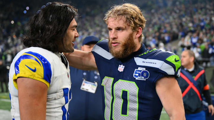 Jan 25, 2026; Seattle, WA, USA; Seattle Seahawks wide receiver Cooper Kupp (10) and Los Angeles Rams wide receiver Puka Nacua (12) talk after the 2026 NFC Championship Game at Lumen Field.