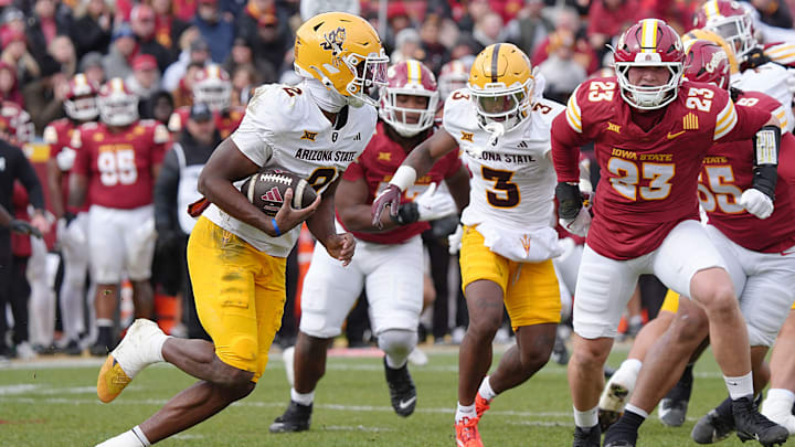 Arizona State Sun Devils quarterback Jeff Sims (2) runs with the ball as Iowa State Cyclones' linebacker Will McLaughlin (23) rushes to tackle during the first quarter in the Big-12 showdown at jack Trice Stadium on Nov. 1, 2025, in Ames, Iowa. Arizona State Sun Devils quarterback Jeff Sims (2) runs with the ball as Iowa State Cyclones' linebacker Will McLaughlin (23) rushes to tackle during the first quarter in the Big-12 showdown at jack Trice Stadium on Nov. 1, 2025, in Ames, Iowa.