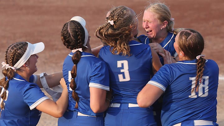 Van Meter softball team celebrates the 2A Iowa high school state softball championship at Rogers Sports complex on Friday, July 26, 2024, in Fort Dodge, Iowa.