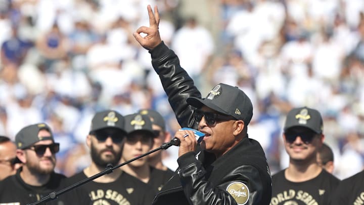 Dodgers manager Dave Roberts speaks to the fans during the 2025 World Series championship celebration at Dodger Stadium in Los Angeles on Monday, Nov. 3, 2025.
