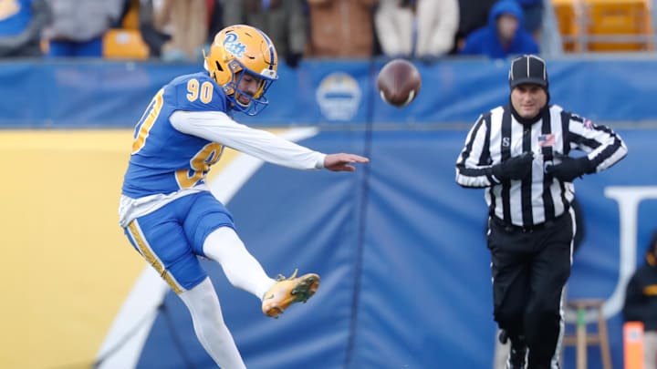 Nov 19, 2022; Pittsburgh, Pennsylvania, USA;  Pittsburgh Panthers place kicker Ben Sauls (90) kicks the ball to the Duke Blue Devils during the fourth quarter at Acrisure Stadium. Mandatory Credit: Charles LeClaire-Imagn Images