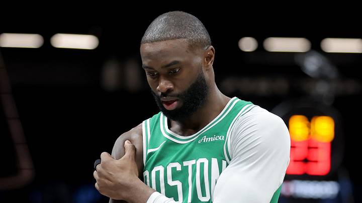 Nov 18, 2025; Brooklyn, New York, USA; Boston Celtics guard Jaylen Brown (7) holds his right shoulder during the second quarter against the Brooklyn Nets at Barclays Center. Mandatory Credit: Brad Penner-Imagn Images