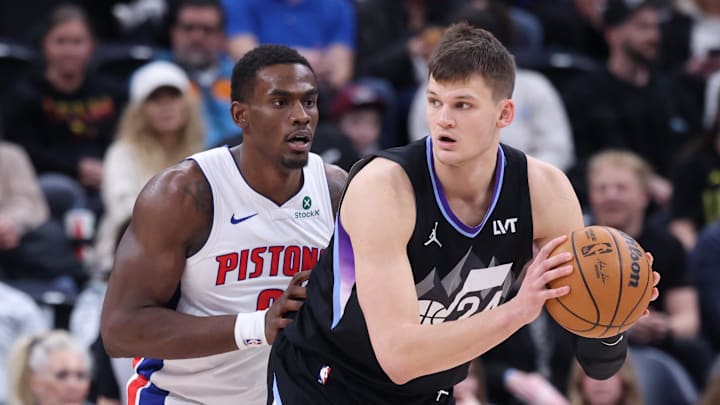 Mar 3, 2025; Salt Lake City, Utah, USA; Utah Jazz center Walker Kessler (24) posts up against Detroit Pistons center Jalen Duren (0) during the first half at Delta Center. Mandatory Credit: Rob Gray-Imagn Images