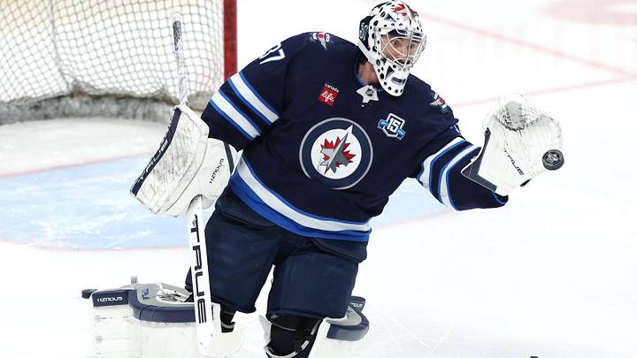 Apr 6, 2026; Winnipeg, Manitoba, CAN; Winnipeg Jets goaltender Connor Hellebuyck (37) warms up before a game against the Seattle Kraken at Canada Life Centre. Mandatory Credit: James Carey Lauder-Imagn Images
