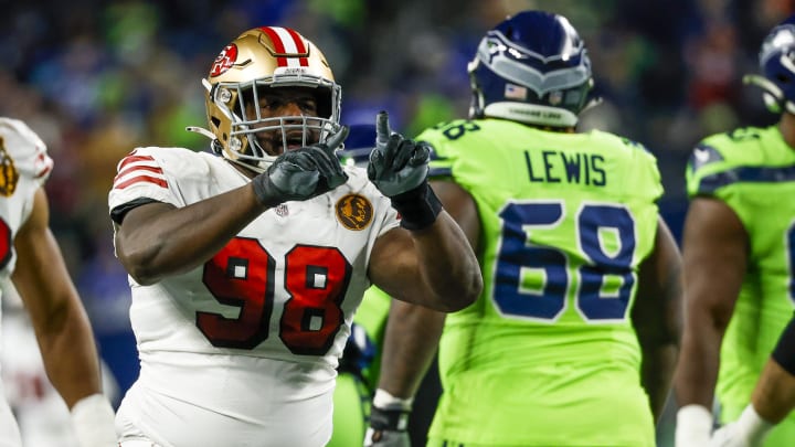 Nov 23, 2023; Seattle, Washington, USA; San Francisco 49ers defensive tackle Javon Hargrave (98) celebrates after a sack against the Seattle Seahawks during the second quarter at Lumen Field. Mandatory Credit: Joe Nicholson-USA TODAY Sports