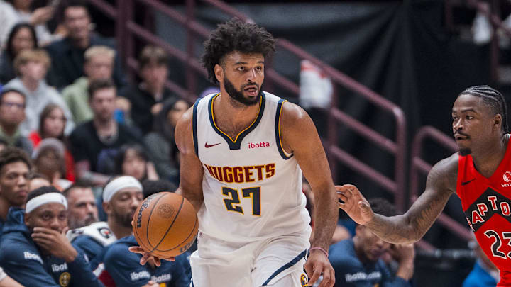 Oct 6, 2025; Vancouver, British Columbia, CAN; Toronto Raptors guard Jamal Shead (23) defends against Denver Nuggets guard Jamal Murray (27) in the first half at Rogers Arena. Mandatory Credit: Bob Frid-Imagn Images Oct 6, 2025; Vancouver, British Columbia, CAN; Toronto Raptors guard Jamal Shead (23) defends against Denver Nuggets guard Jamal Murray (27) in the first half at Rogers Arena. Mandatory Credit: Bob Frid-Imagn Images