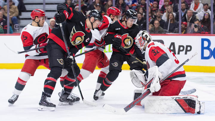 Jan 24, 2026; Ottawa, Ontario, CAN; Ottawa Senators left wing Brady Tkachuk (7) is unable to capitalize on a loose puck in front of Carolina Hurricanes goalie Brandon Bussi (32) in the first period at the Canadian Tire Centre. Mandatory Credit: Marc DesRosiers-IMAGN Images Jan 24, 2026; Ottawa, Ontario, CAN; Ottawa Senators left wing Brady Tkachuk (7) is unable to capitalize on a loose puck in front of Carolina Hurricanes goalie Brandon Bussi (32) in the first period at the Canadian Tire Centre. Mandatory Credit: Marc DesRosiers-IMAGN Images