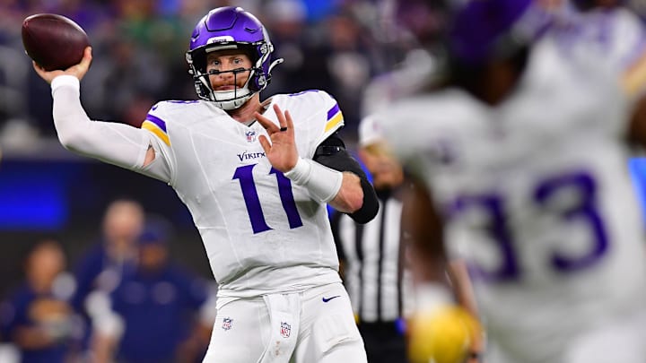 Oct 23, 2025; Inglewood, California, USA; Minnesota Vikings quarterback Carson Wentz (11) drops back to pass against the Los Angeles Chargers during the second half at SoFi Stadium. Mandatory Credit: Gary A. Vasquez-Imagn Images