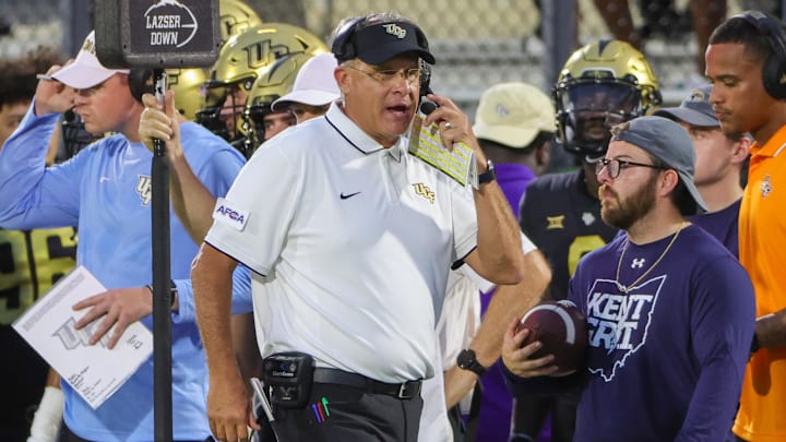 Aug 31, 2023; Orlando, Florida, USA; UCF Knights head coach Gus Malzahn walks the sideline during the first quarter against the Kent State Golden Flashes at FBC Mortgage Stadium. Mandatory Credit: Mike Watters-USA TODAY Sports battle for the ball