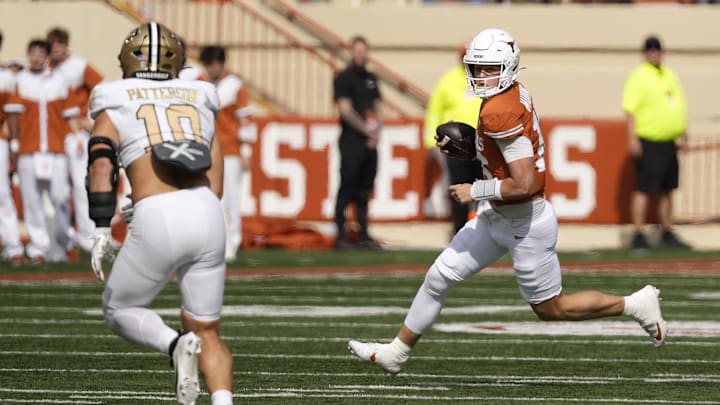 Nov 1, 2025; Austin, Texas, USA; Texas Longhorns quarterback Arch Manning (16) runs the ball during the first half against the Vanderbilt Commodores at Darrell K Royal-Texas Memorial Stadium. Mandatory Credit: Scott Wachter-Imagn Images