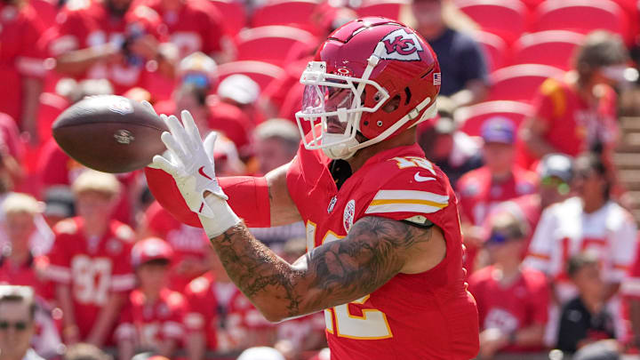 Aug 17, 2024; Kansas City, Missouri, USA; Kansas City Chiefs tight end Jared Wiley (12) warms up against the Detroit Lions prior to the game at GEHA Field at Arrowhead Stadium. Mandatory Credit: Denny Medley-Imagn Images