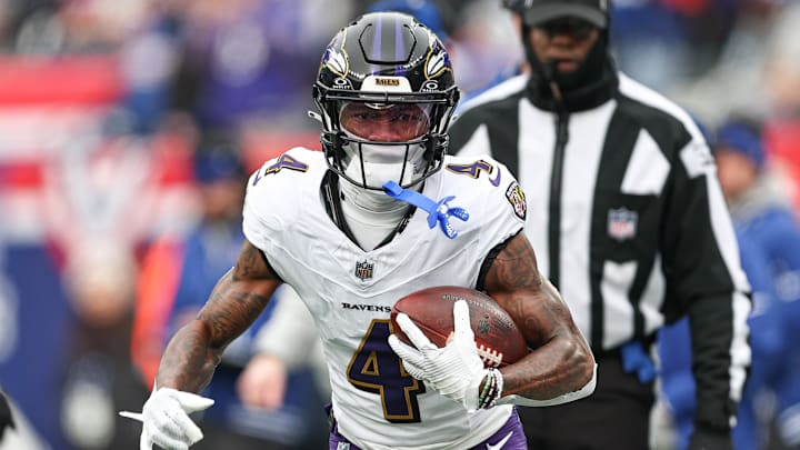 Baltimore Ravens wide receiver Zay Flowers carries the ball against the New York Giants.