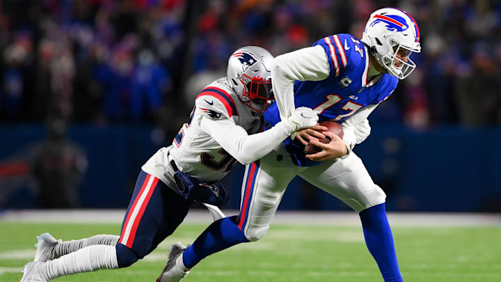 Jan 15, 2022; Orchard Park, New York, USA; Buffalo Bills quarterback Josh Allen (17) runs with the