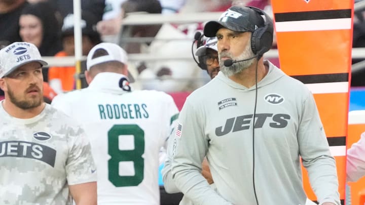 New York Jets interim head coach Jeff Ulbrich watches his team play against the Arizona Cardinals during the second quarter at State Farm Stadium.