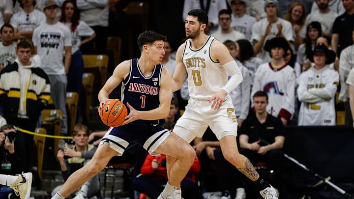 Feb 10, 2024; Boulder, Colorado, USA; Arizona Wildcats forward Filip Borovicanin (1) controls the