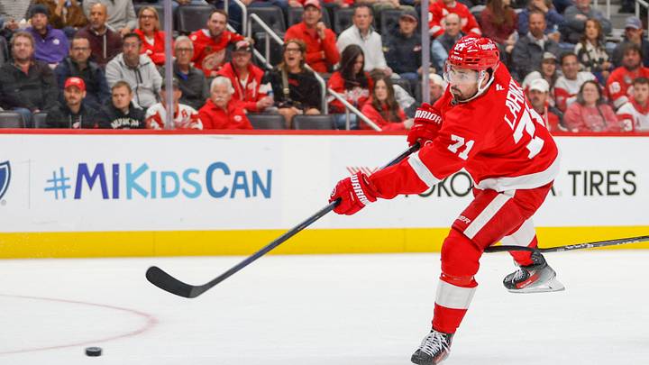 Oct 6, 2026; Detroit, Michigan, USA; Detroit Red Wings center Dylan Larkin (71) shoots the puck during the second period against the Ottawa Senators at Little Caesars Arena. Mandatory Credit: Brian Bradshaw Sevald-Imagn Images Oct 6, 2026; Detroit, Michigan, USA; Detroit Red Wings center Dylan Larkin (71) shoots the puck during the second period against the Ottawa Senators at Little Caesars Arena. Mandatory Credit: Brian Bradshaw Sevald-Imagn Images