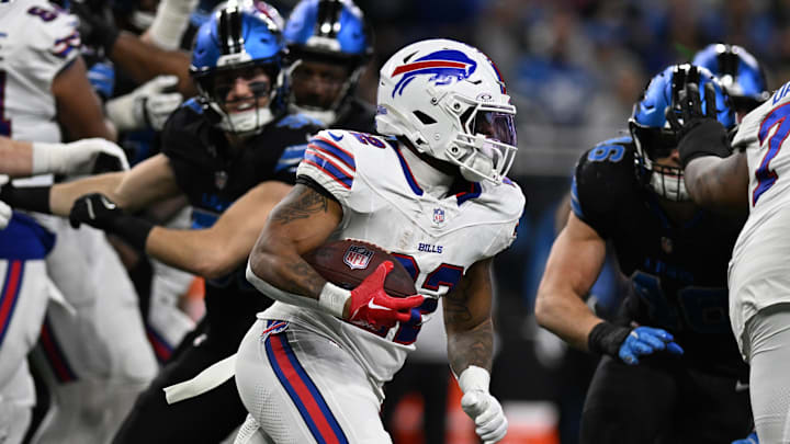 Buffalo Bills running back Ray Davis (22) runs the ball against the Detroit Lions in the second quarter at Ford Field. Buffalo Bills running back Ray Davis (22) runs the ball against the Detroit Lions in the second quarter at Ford Field.