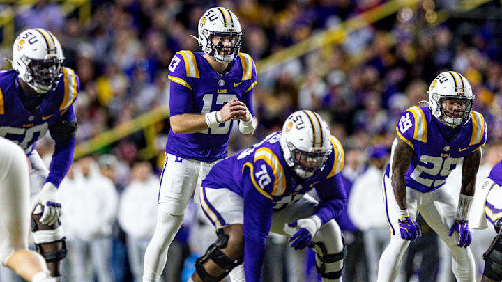 Nov 30, 2024; Baton Rouge, Louisiana, USA;  LSU Tigers quarterback Garrett Nussmeier (13) calls for the ball against the Oklahoma Sooners during the first quarter at Tiger Stadium. Mandatory Credit: Stephen Lew-Imagn Images