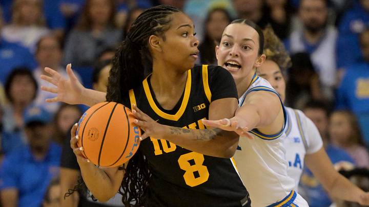 Feb 1, 2026; Los Angeles, California, USA; UCLA Bruins forward Angela Dugalic (32) defends Iowa Hawkeyes guard Journey Houston (8) in the first half at Pauley Pavilion presented by Wescom Financial. Mandatory Credit: Jayne Kamin-Oncea-Imagn Images Feb 1, 2026; Los Angeles, California, USA; UCLA Bruins forward Angela Dugalic (32) defends Iowa Hawkeyes guard Journey Houston (8) in the first half at Pauley Pavilion presented by Wescom Financial. Mandatory Credit: Jayne Kamin-Oncea-Imagn Images