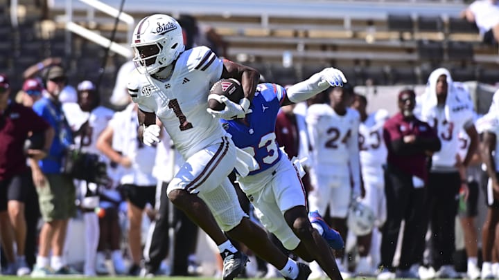 Sep 21, 2024; Starkville, Mississippi, USA; Mississippi State Bulldogs wide receiver Kelly Akharaiyi (1) runs the ball against the Florida Gators during the fourth quarter at Davis Wade Stadium at Scott Field. Mandatory Credit: Matt Bush-Imagn Images