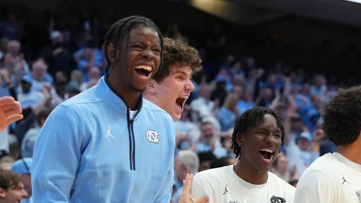 Feb 23, 2026; Chapel Hill, North Carolina, USA; North Carolina Tar Heels forward Caleb Wilson (8) and the bench react in the second half at Dean E. Smith Center. Mandatory Credit: Bob Donnan-Imagn Images