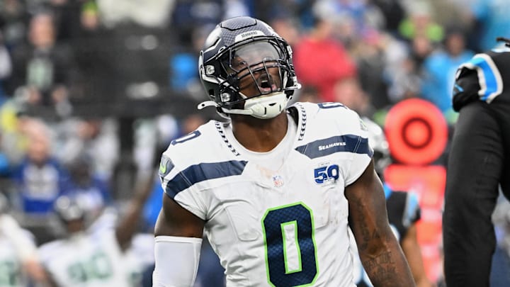 Dec 28, 2025; Charlotte, North Carolina, USA; Seattle Seahawks defensive end DeMarcus Lawrence (0) reacts against the Carolina Panthers during the fourth quarter at Bank of America Stadium. Mandatory Credit: Bob Donnan-Imagn Images Dec 28, 2025; Charlotte, North Carolina, USA; Seattle Seahawks defensive end DeMarcus Lawrence (0) reacts against the Carolina Panthers during the fourth quarter at Bank of America Stadium. Mandatory Credit: Bob Donnan-Imagn Images