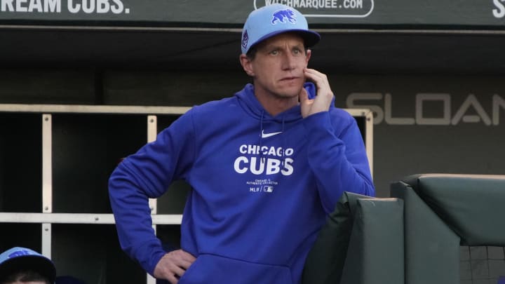 Mar 12, 2024; Mesa, Arizona, USA; Chicago Cubs manager Craig Counsell watches from the dugout against the Milwaukee Brewers in the first inning at Sloan Park.