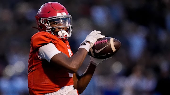 Brentwood Academy's Eli Ferguson (5) receives a pass against Brentwood during the first half at Brentwood Academy in Brentwood, Tenn., Friday, Aug. 30, 2024. Brentwood Academy's Eli Ferguson (5) receives a pass against Brentwood during the first half at Brentwood Academy in Brentwood, Tenn., Friday, Aug. 30, 2024.