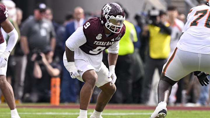 Dec 20, 2025; College Station, TX, USA; Texas A&M Aggies defensive end Cashius Howell (9) lines up during the game between the Aggies and the Hurricanes