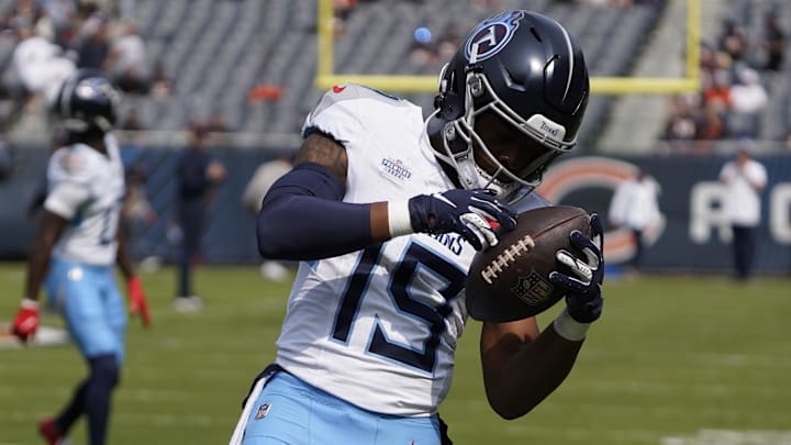 Sep 8, 2024; Chicago, Illinois, USA; Tennessee Titans wide receiver Nick Westbrook-Ikhine (15) warms up before the game against the Chicago Bears at Soldier Field. Mandatory Credit: David Banks-Imagn Images