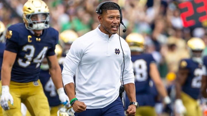 Notre Dame coach Marcus Freeman celebrates a turnover by the defense agains Purdue during the first half at Notre Dame Stadium.