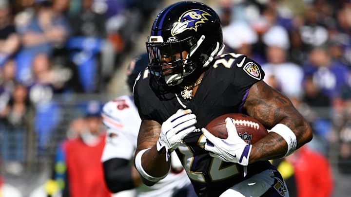 Oct 26, 2025; Baltimore, Maryland, USA; Baltimore Ravens running back Derrick Henry (22) rushes during the second quarter against the Chicago Bears at M&T Bank Stadium. Mandatory Credit: Tommy Gilligan-Imagn Images