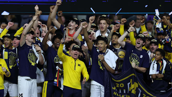 Apr 6, 2026; Indianapolis, IN, USA; Michigan Wolverines head coach Dusty May celebrates after defeating the UConn Huskies in the national championship of the Final Four of the men's 2026 NCAA Tournament at Lucas Oil Stadium. Mandatory Credit: Trevor Ruszkowski-Imagn Images