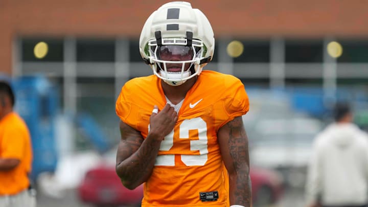 Tennessee defensive back Boo Carter (23) pulls on his jersey during Tennessee football preseason practice, in Knoxville, Tennessee, Aug. 6, 2025.