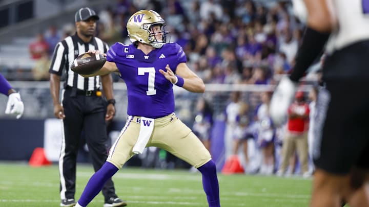 Aug 31, 2024; Seattle, Washington, USA; Washington Huskies quarterback Will Rogers (7) passes against the Weber State Wildcats during the third quarter at Alaska Airlines Field at Husky Stadium. Mandatory Credit: Joe Nicholson-Imagn Images