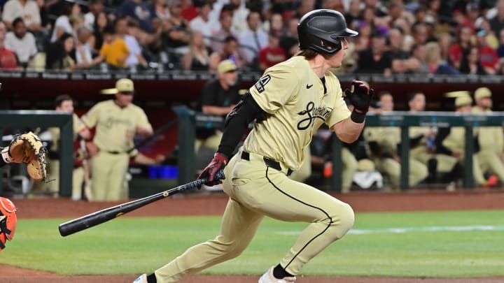 Jun 4, 2024; Phoenix, Arizona, USA; Arizona Diamondbacks outfielder Jake McCarthy (31) singles in the third inning against the San Francisco Giants at Chase Field. Jun 4, 2024; Phoenix, Arizona, USA; Arizona Diamondbacks outfielder Jake McCarthy (31) singles in the third inning against the San Francisco Giants at Chase Field.
