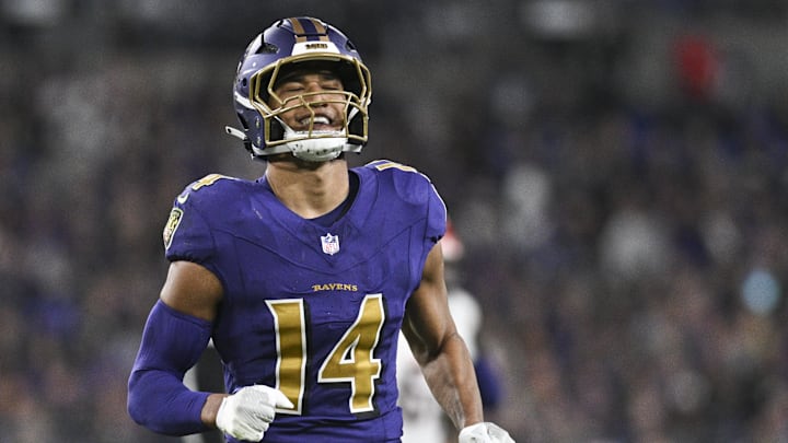 Baltimore Ravens safety Kyle Hamilton reacts after tipping a pass by Cincinnati Bengals quarterback Joe Burrow.