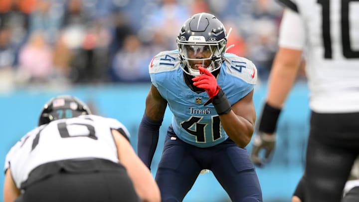Dec 8, 2024; Nashville, Tennessee, USA;  Tennessee Titans linebacker Otis Reese IV (41) looks into the backfield against the Jacksonville Jaguars during the first half at Nissan Stadium. Mandatory Credit: Steve Roberts-Imagn Images