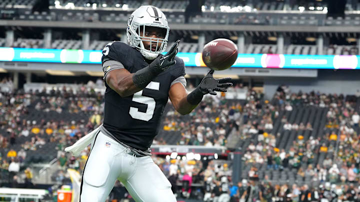 Oct 9, 2023; Paradise, Nevada, USA; Las Vegas Raiders linebacker Divine Deablo (5) warms up before a game against the Green Bay Packers at Allegiant Stadium. Mandatory Credit: Stephen R. Sylvanie-Imagn Images