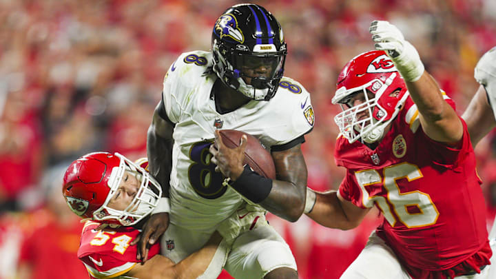 Sep 5, 2024; Kansas City, Missouri, USA; Baltimore Ravens quarterback Lamar Jackson (8) is tackled by Kansas City Chiefs linebacker Leo Chenal (54) and defensive end George Karlaftis (56) during the second half at GEHA Field at Arrowhead Stadium. Mandatory Credit: Jay Biggerstaff-Imagn Images Sep 5, 2024; Kansas City, Missouri, USA; Baltimore Ravens quarterback Lamar Jackson (8) is tackled by Kansas City Chiefs linebacker Leo Chenal (54) and defensive end George Karlaftis (56) during the second half at GEHA Field at Arrowhead Stadium. Mandatory Credit: Jay Biggerstaff-Imagn Images