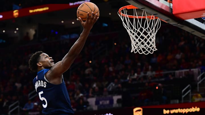 Jan 10, 2026; Cleveland, Ohio, USA; Minnesota Timberwolves guard Anthony Edwards (5) drives to the basket against against the Cleveland Cavaliers during the second half at Rocket Arena.
