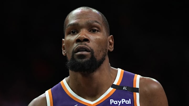 Mar 26, 2025; Phoenix, Arizona, USA; Phoenix Suns forward Kevin Durant (35) looks on against the Boston Celtics during the second half at Footprint Center. Mandatory Credit: Rick Scuteri-Imagn Images