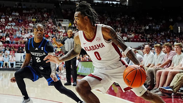 Nov 4, 2024; Tuscaloosa, Alabama, USA; UNC Asheville guard Jordan Marsh (2) guards Alabama guard Labaron Philon (0) at Coleman Coliseum.