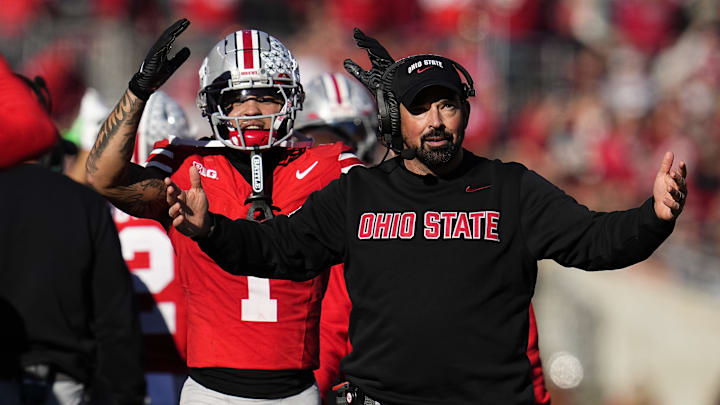 Ohio State Buckeyes head coach Ryan Day and wide receiver Brandon Inniss (1) react during the second half of the NCAA football game against the Rutgers Scarlet Knights at Ohio Stadium in Columbus on Nov. 22, 2025. Ohio State won 42-9. Ohio State Buckeyes head coach Ryan Day and wide receiver Brandon Inniss (1) react during the second half of the NCAA football game against the Rutgers Scarlet Knights at Ohio Stadium in Columbus on Nov. 22, 2025. Ohio State won 42-9.