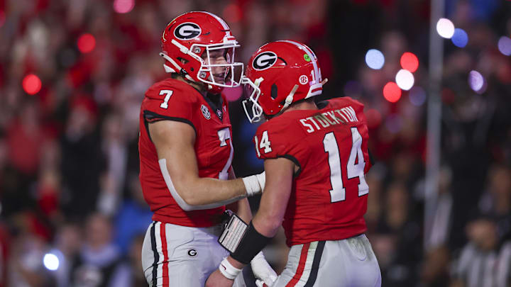 Nov 15, 2025; Athens, Georgia, USA; Georgia Bulldogs tight end Lawson Luckie (7) and quarterback Gunner Stockton (14) celebrate in the second half against the Texas Longhorns at Sanford Stadium. Mandatory Credit: Brett Davis-Imagn Images
