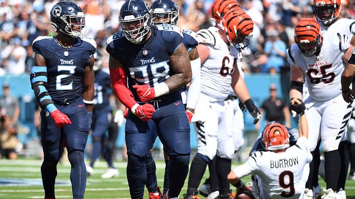 Oct 1, 2023; Nashville, Tennessee, USA; Tennessee Titans defensive tackle Jeffery Simmons (98) celebrates after a sack against Cincinnati Bengals quarterback Joe Burrow (9) during the first half at Nissan Stadium. Mandatory Credit: Christopher Hanewinckel-USA TODAY Sports Oct 1, 2023; Nashville, Tennessee, USA; Tennessee Titans defensive tackle Jeffery Simmons (98) celebrates after a sack against Cincinnati Bengals quarterback Joe Burrow (9) during the first half at Nissan Stadium. Mandatory Credit: Christopher Hanewinckel-USA TODAY Sports