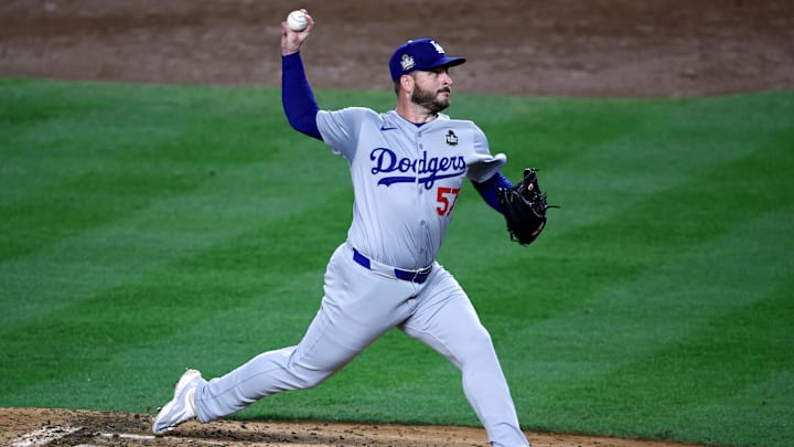 Oct 30, 2024; New York, New York, USA; Los Angeles Dodgers pitcher Ryan Brasier (57) throws during the third inning against the New York Yankees in game five of the 2024 MLB World Series at Yankee Stadium. Oct 30, 2024; New York, New York, USA; Los Angeles Dodgers pitcher Ryan Brasier (57) throws during the third inning against the New York Yankees in game five of the 2024 MLB World Series at Yankee Stadium.