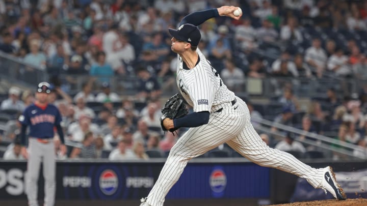 Jul 5, 2024; Bronx, New York, USA; New York Yankees relief pitcher Clay Holmes (35) delivers a pitch during the ninth inning against the Boston Red Sox at Yankee Stadium. Mandatory Credit: Vincent Carchietta-USA TODAY Sports